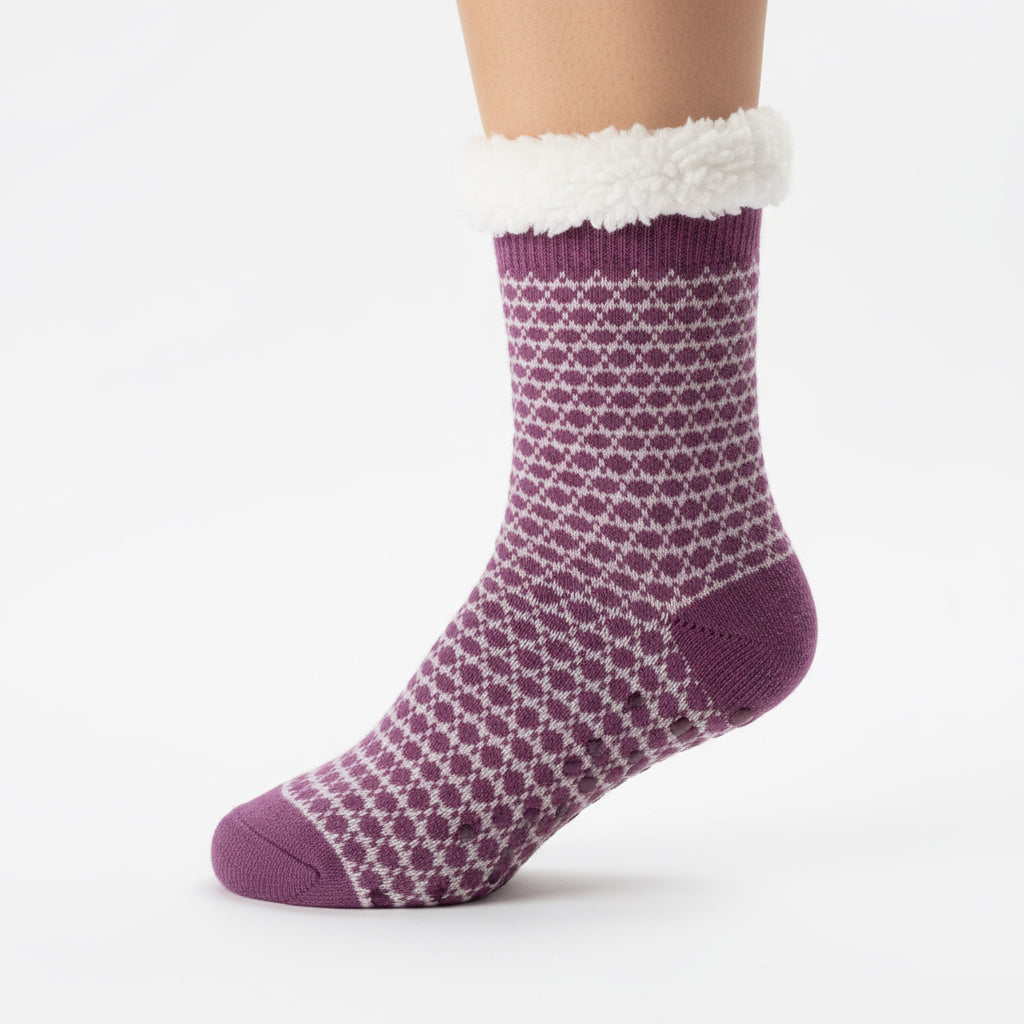 Purple patterned sock with white trim on a white background
