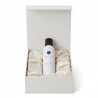 White spray bottle labeled 'Sweet Grace' on a white background