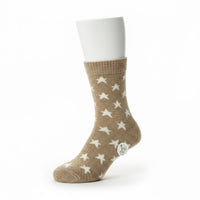 Beige sock with star pattern on a 