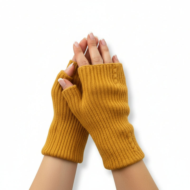  knitted fingerless gloves worn on a white background