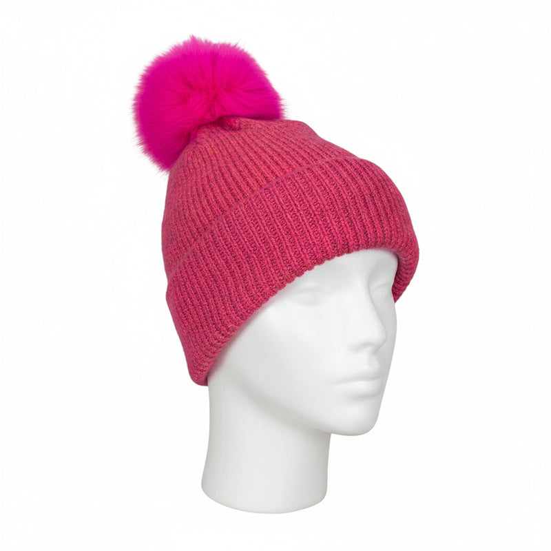 Pink knit beanie with a bright pink pom-pom 