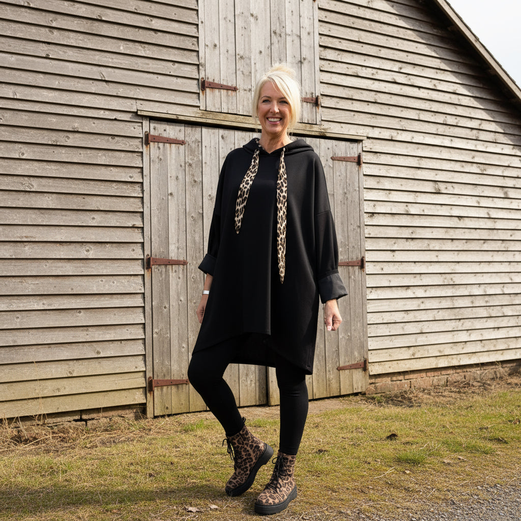 black Scuba top  outfit with leopard print  tie boots 