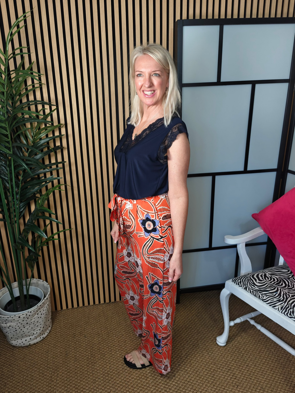 Flower print orange trousers and vest 
