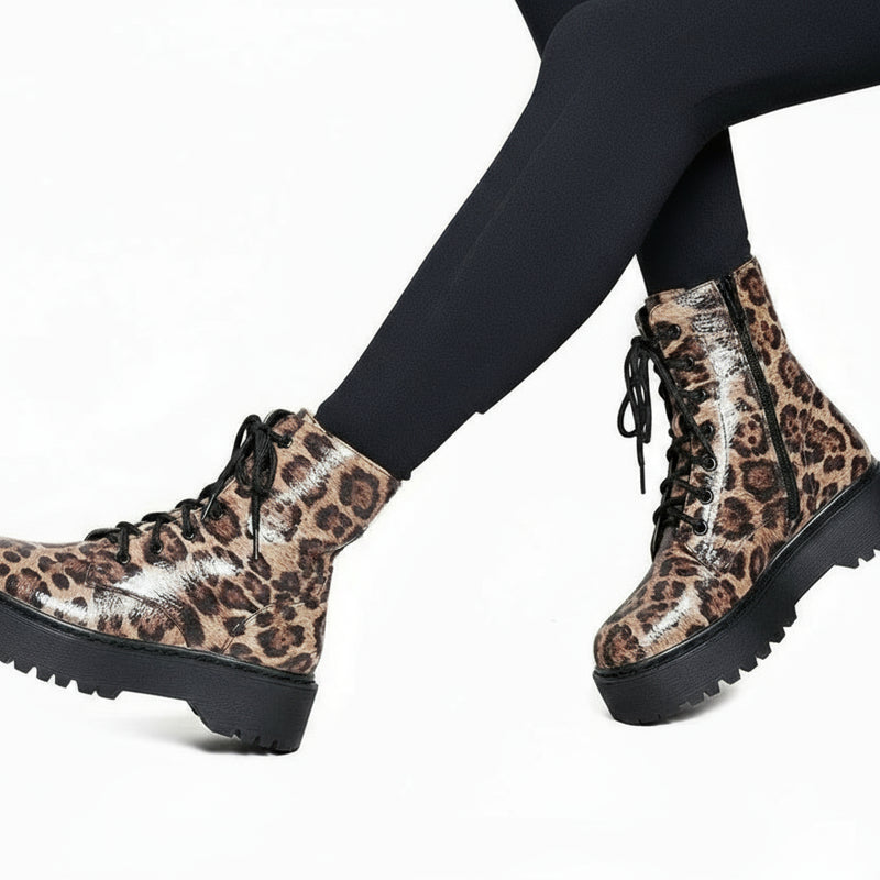 Chunky animal boot with laces and zip fastening. On trend
