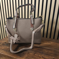 Flower charm hand bag, 2 short handles,  cross body strap colour taupe