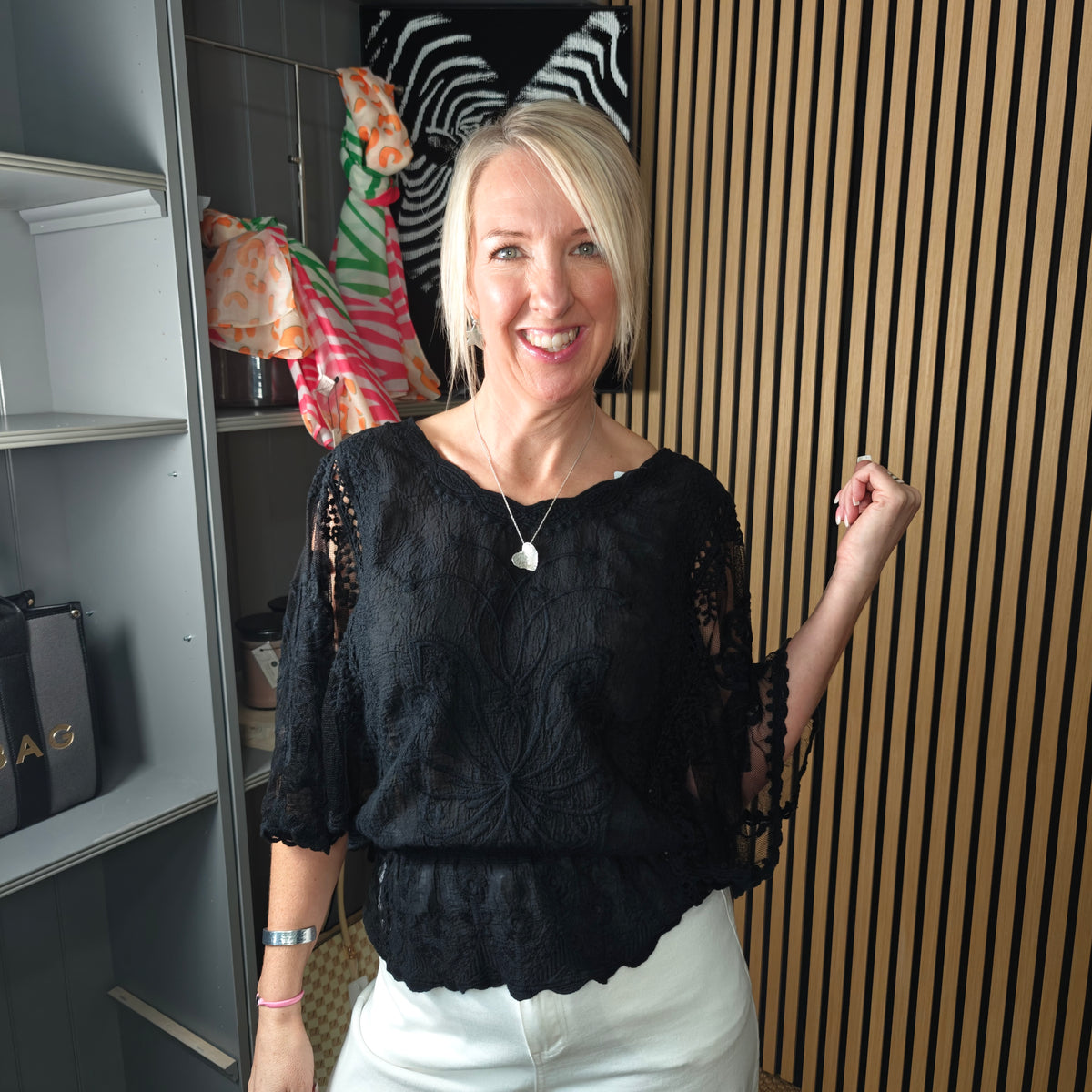 Demi broderie anglaise top black lace with white trousers 