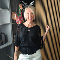 Demi broderie anglaise top black lace with white trousers 