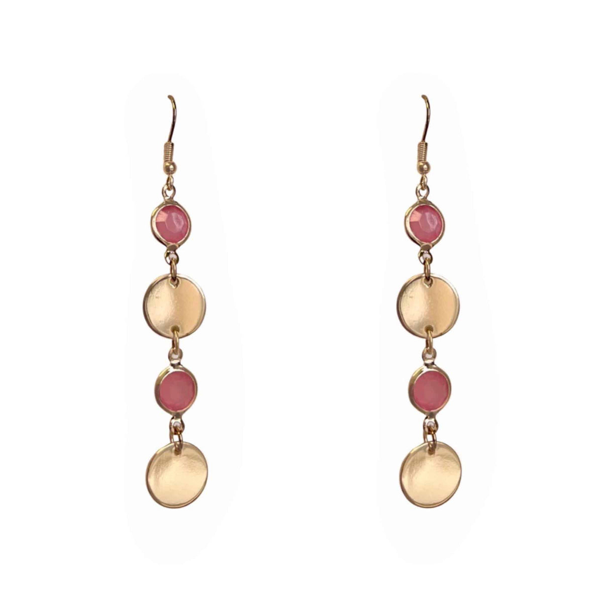 Gold earrings with pink gemstones on a white background