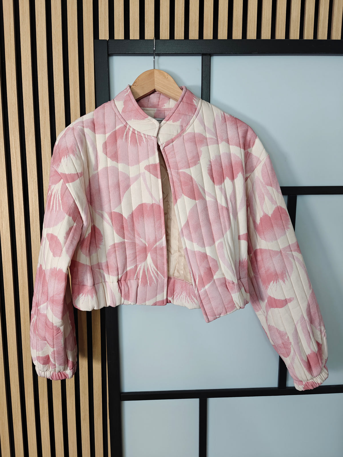 Jacket hanging up on hanger 