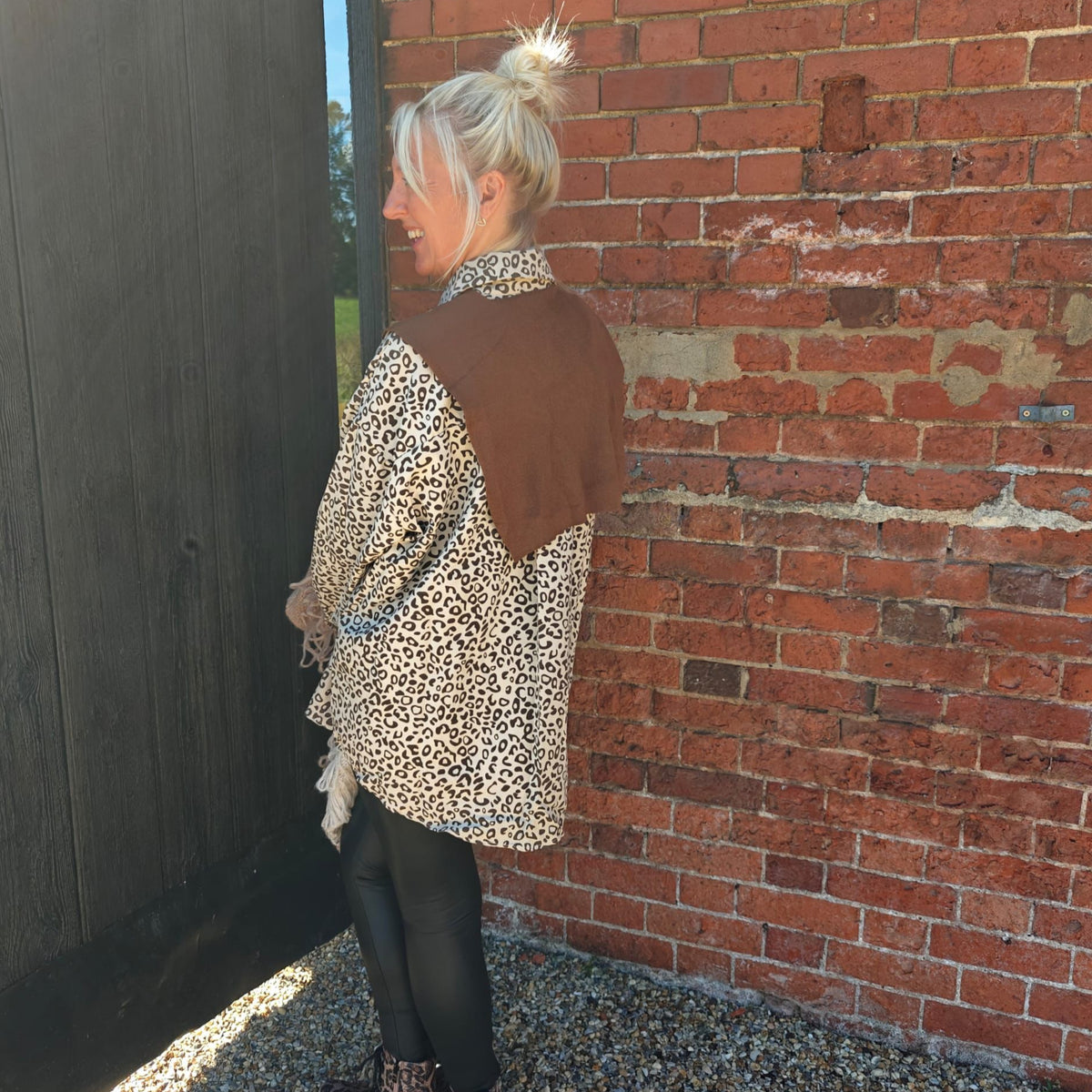  leopard print shirt and brown scarf Swade feel