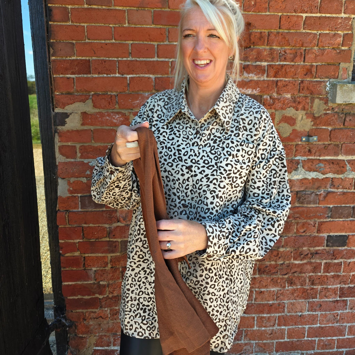  leopard print shirt and brown scarf Swade feel