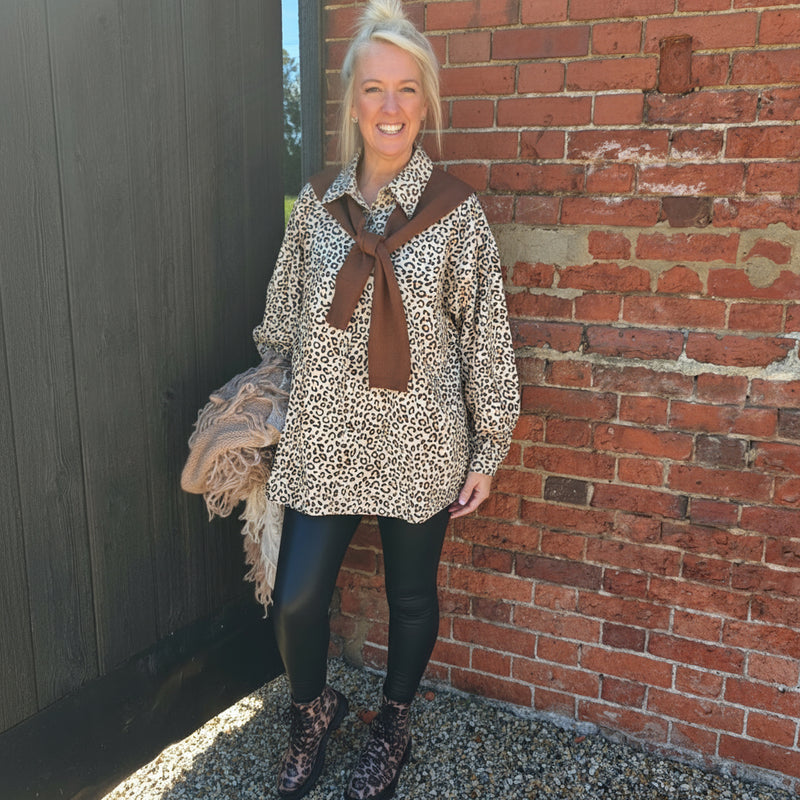  leopard print shirt and brown scarf Swade feel