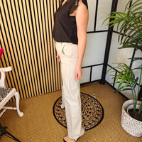 Lady wearing pink stripe jeans 