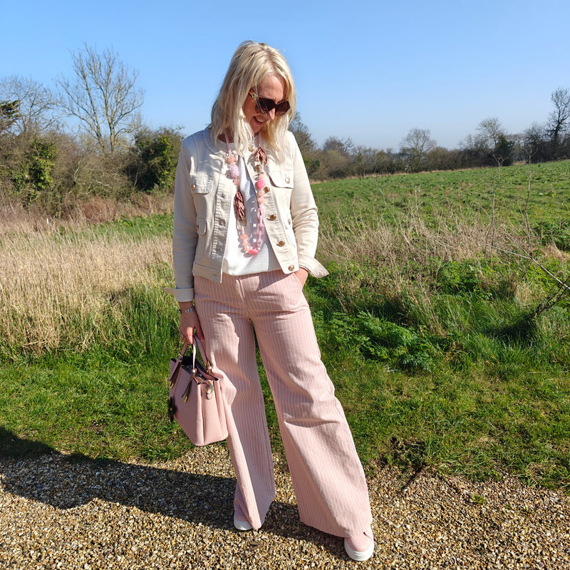Styling brands and top with jacket outside 