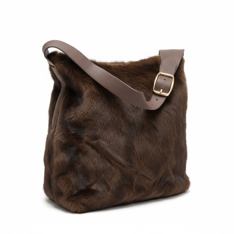  a touch of luxury to your look with this soft faux fur shoulder bag. Designed with a short PU handle for easy carrying