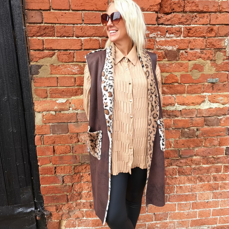  suede-effect gilet features a plush animal fur lining