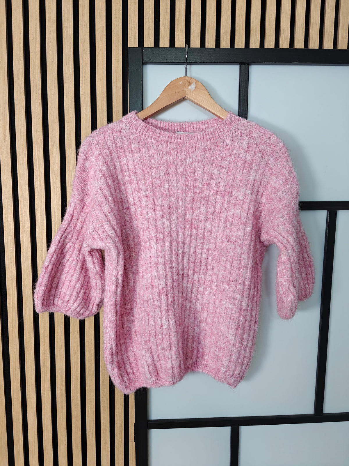 Pink Jumper on hanger
