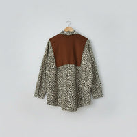  leopard print shirt and brown scarf Swade feel