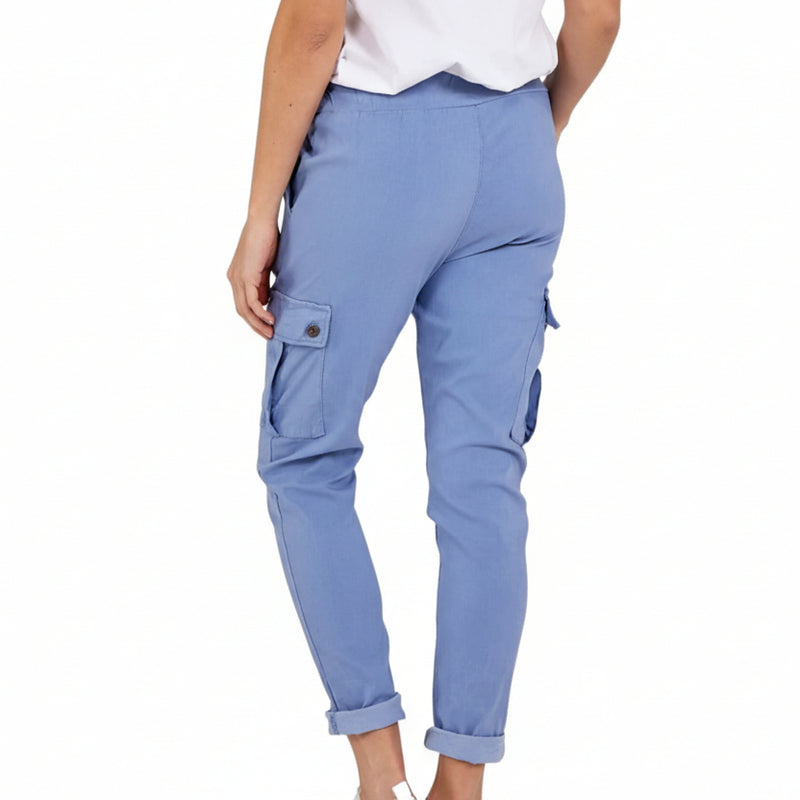Light blue cargo pants worn by a person on a white background