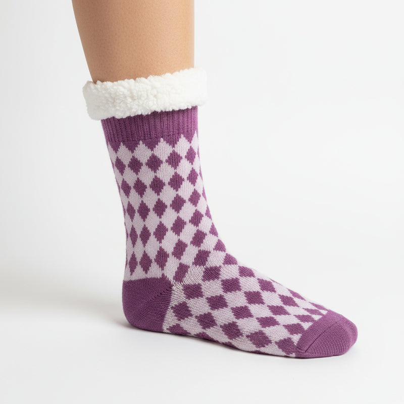 Step into luxury with our super soft, plush Harlequin socks. Designed with non-slip grips on the soles