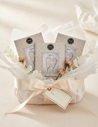 Three 'Sweet Grace' scented sachets on a white background